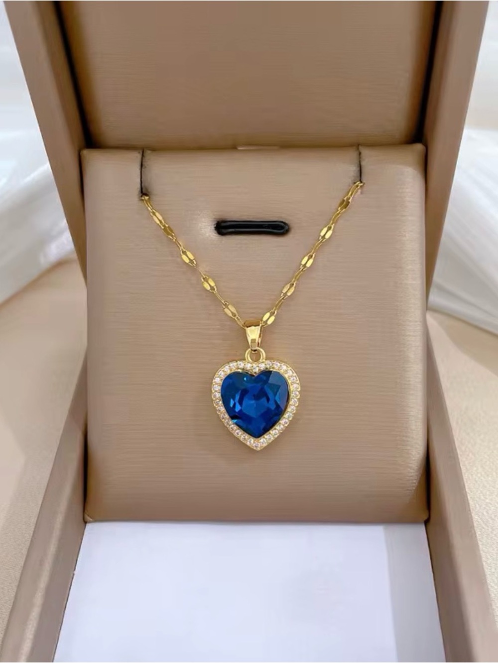 Gold-Tone Heart Necklace with Deep Blue Crystal Pendant
